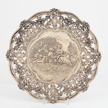 Two silver platters, presumably Wilhelm Weinranck, Hanau, and mock marks, Hanau, Germany, late 19th century.