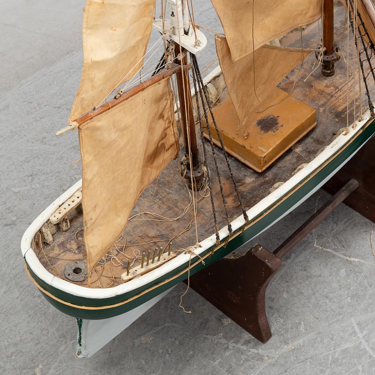 A model of a ship, mid 20th century.