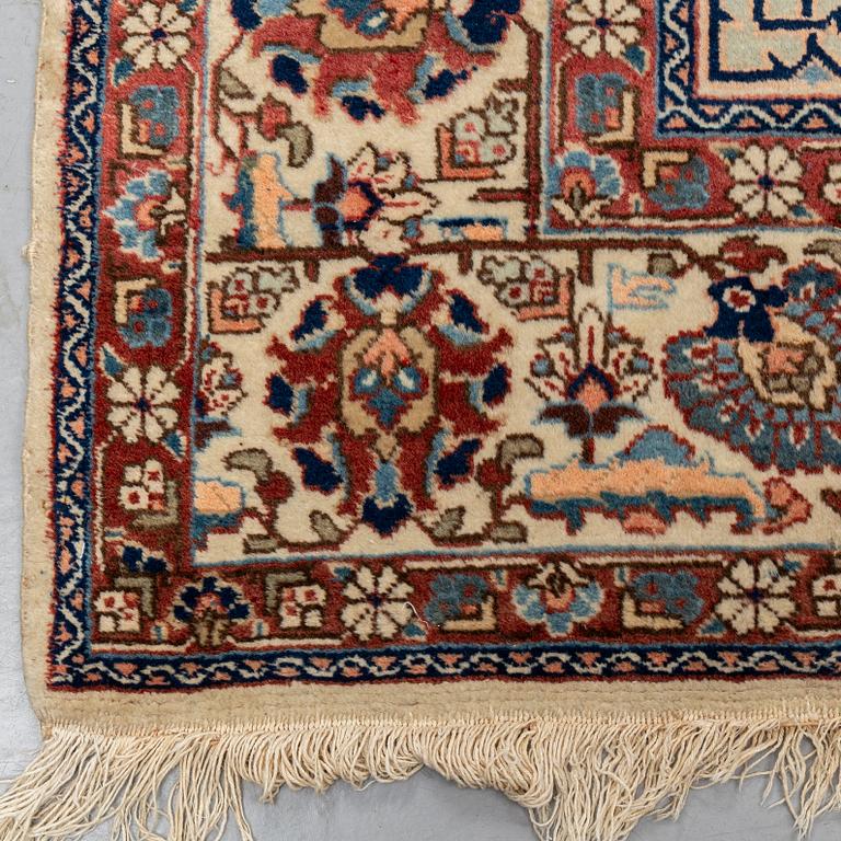 A carpet, semi-antique Tabriz,  342 x 231 cm.