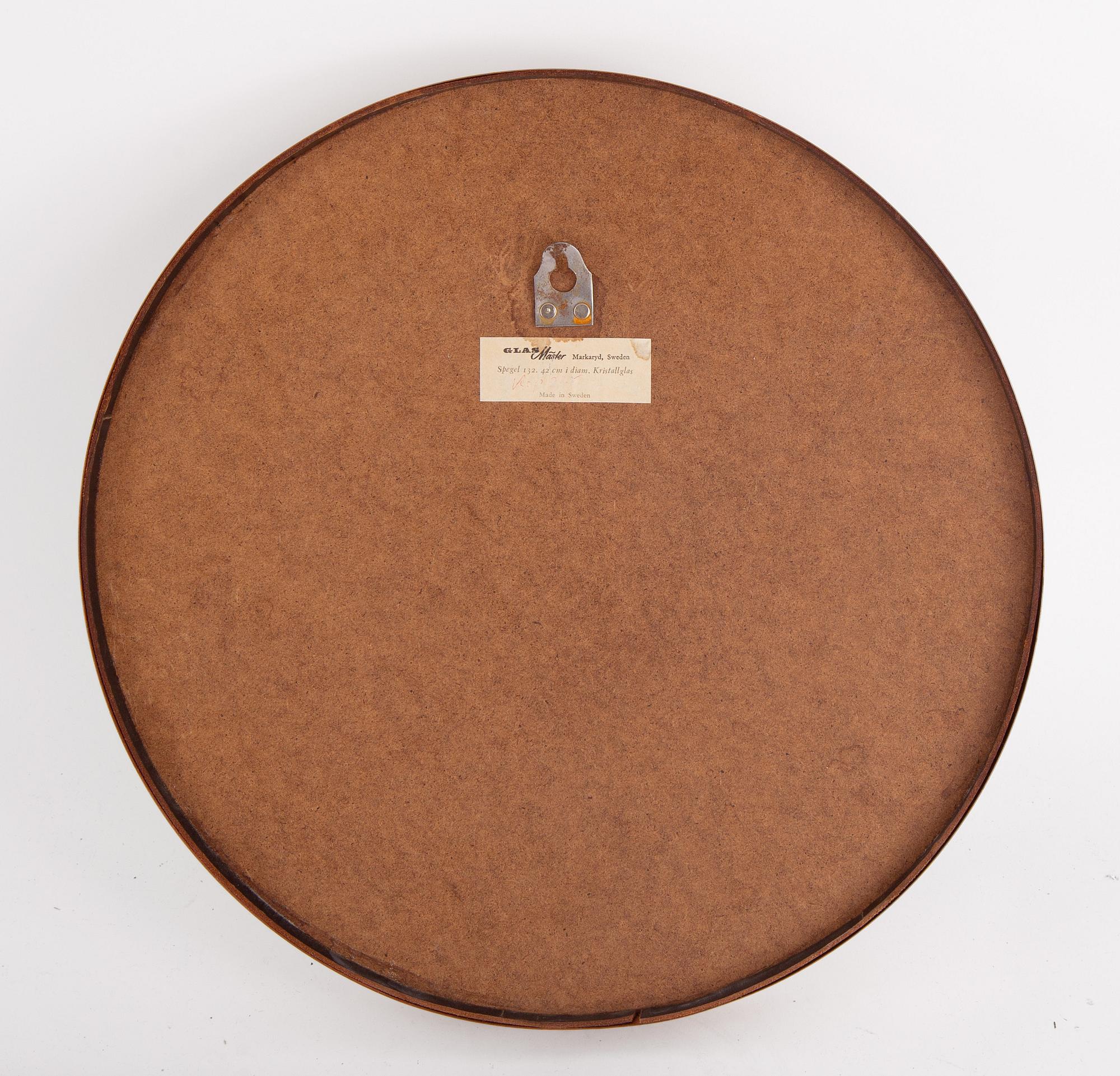 A copper ceiling lamp, by Fog & Mørup, Denmark, and a copper mirror, Markaryd.