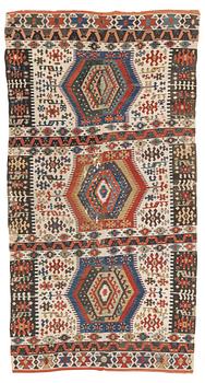 An antique Anatolian kilim, ca 324 x 169 cm.