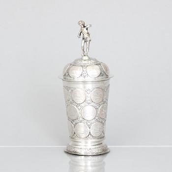 An 19th century parcel-gilt silver cup with lid, unidentified makers mark, probably Nürnberg.