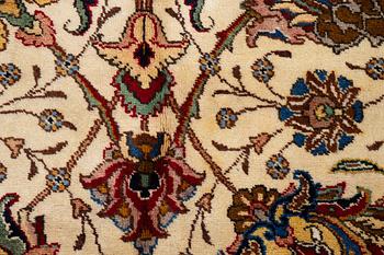 A Tabriz carpet, Northwestern Iran, of Safavid 'palmette' design, c, 483 x 302 cm.