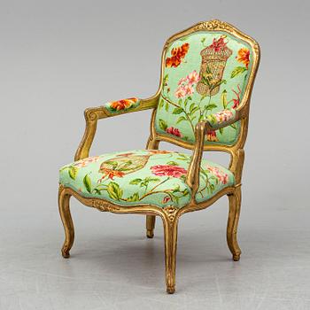 A late 20th century rococo-style armchair.