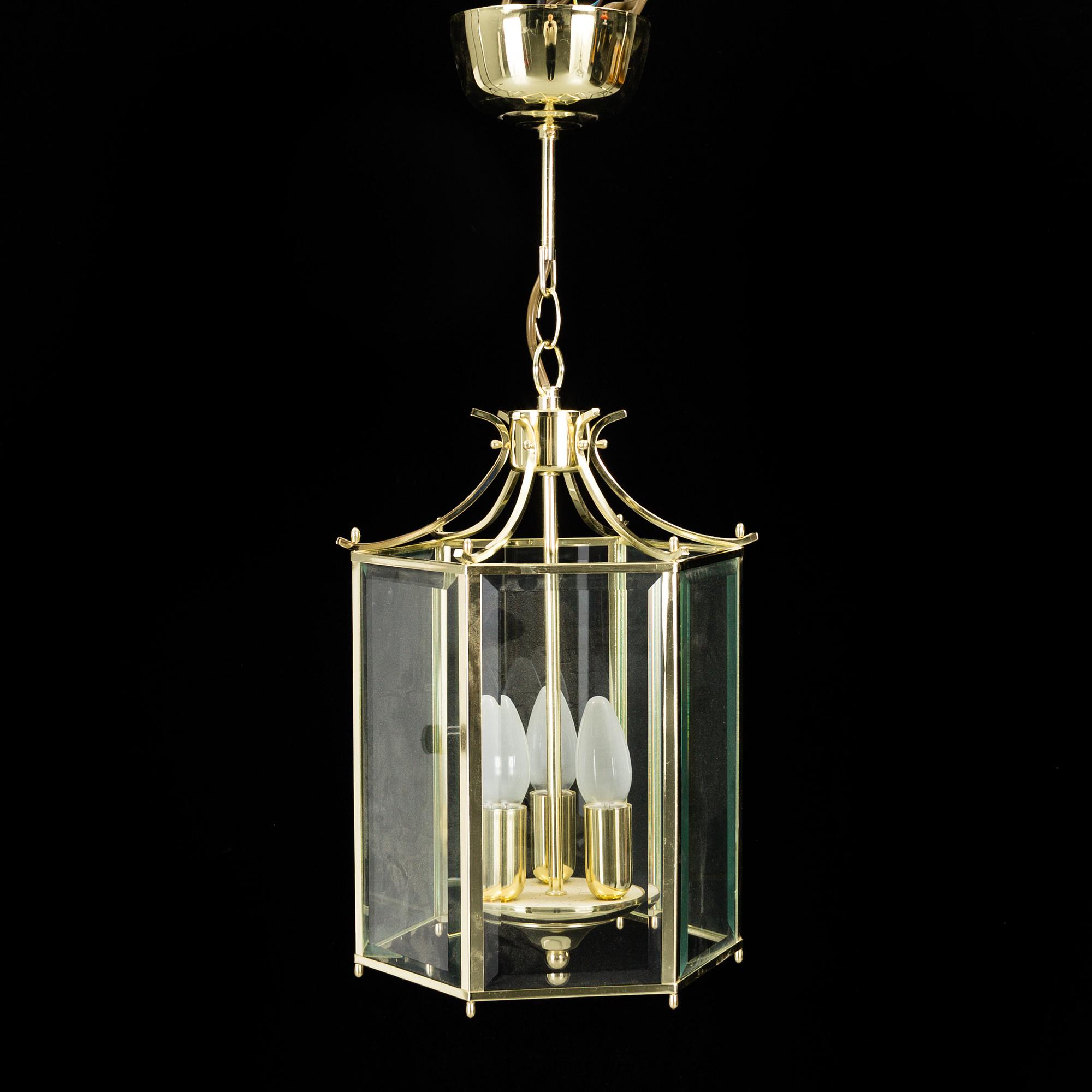 A 20th century brass hexagon hall ceiling lantern for three lights.