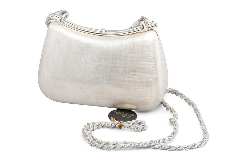 AN EVENING BAG, Rodo.