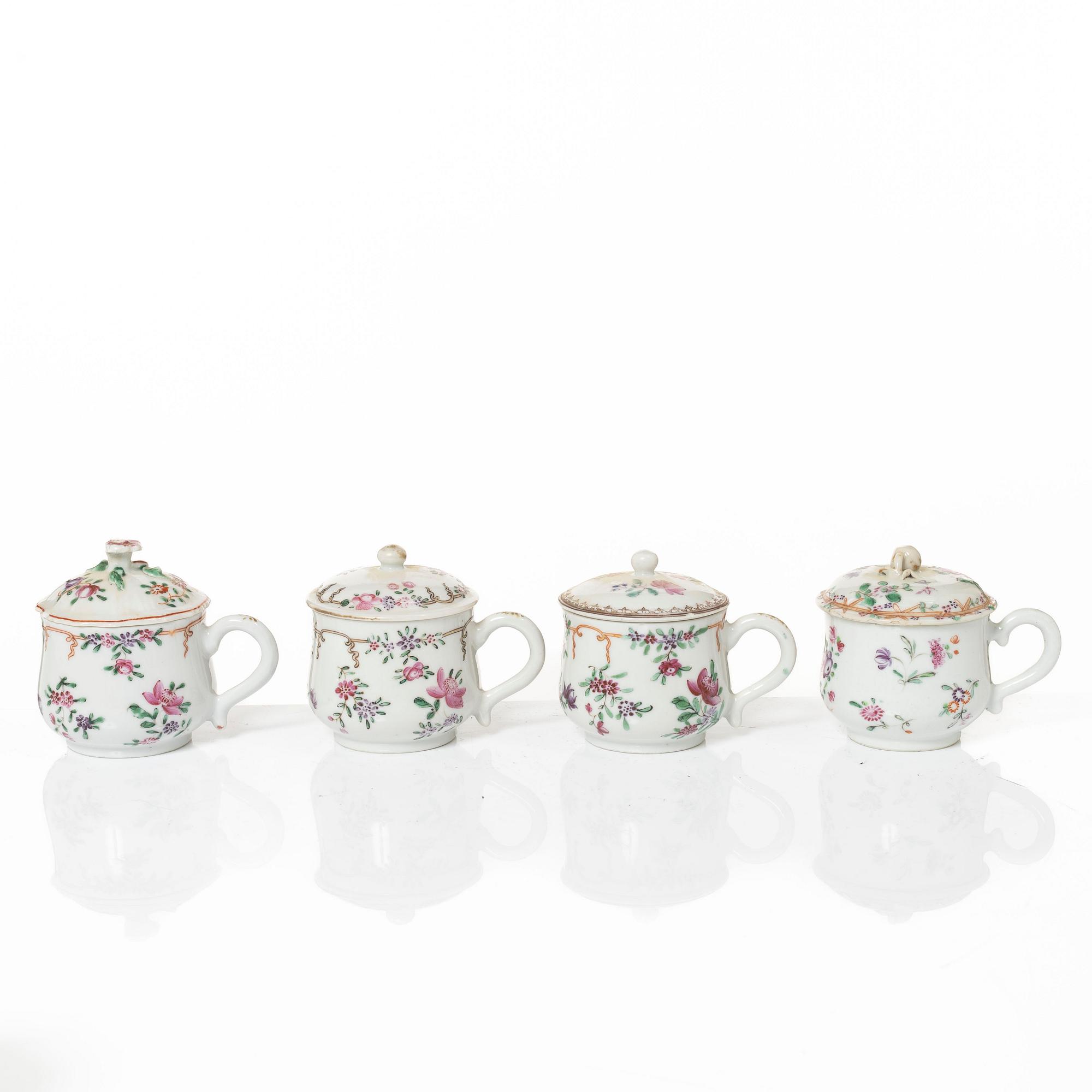 A group of 12 CHinese famille rose porcelain custard cups with covers, Qing dynasty, 18th century.