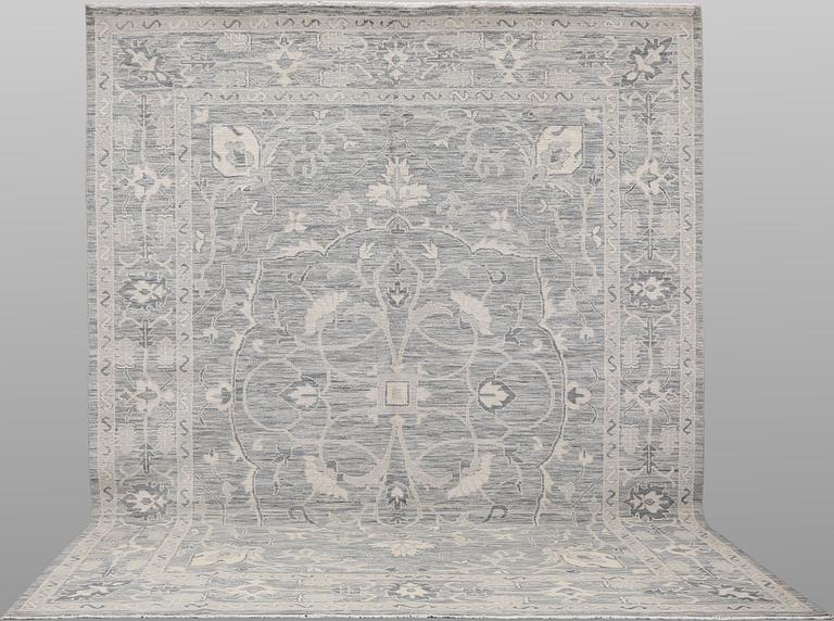 A carpet, Ziegler design, approx. 427 x 305 cm.