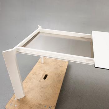 Caronni & Bonanomi, a "Every + Grid" dining table for Desalto 21st century.