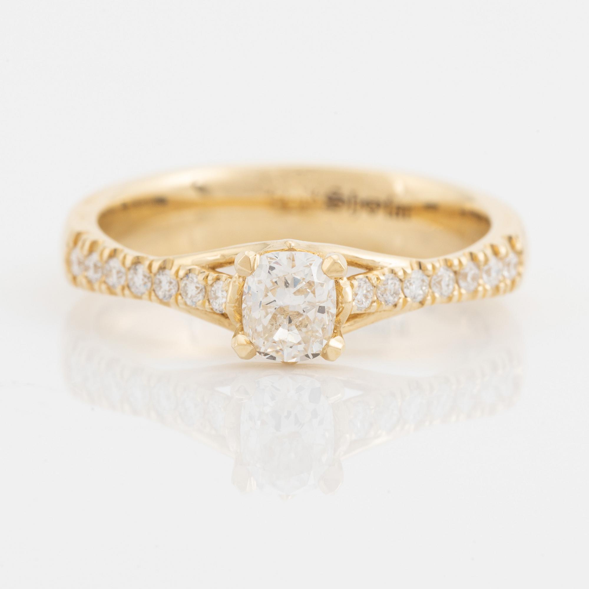 Cushion cut diamond ring.