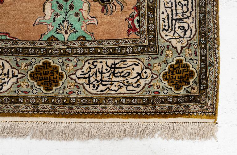 A silk Quum rug, c. 155 x 103 cm.