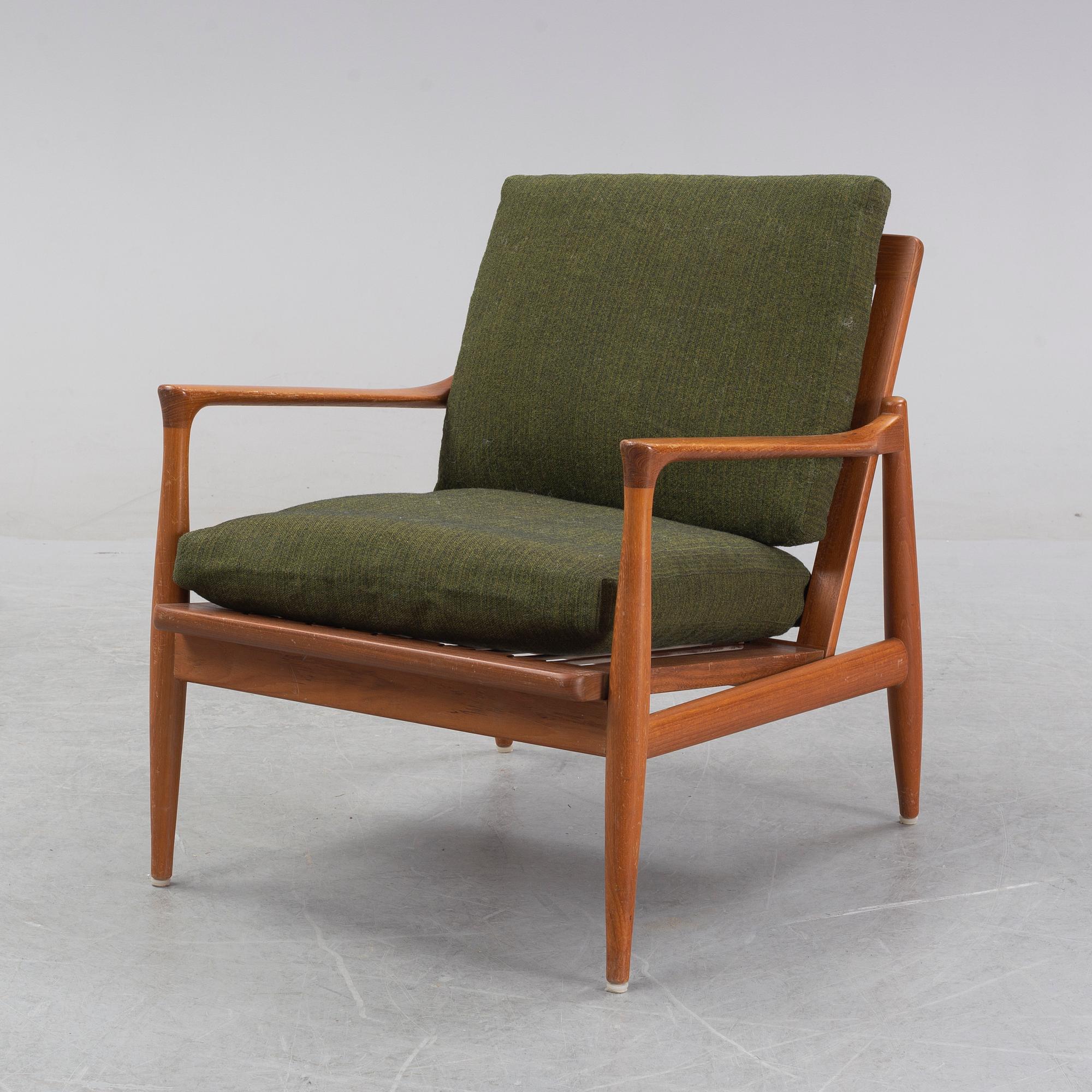 A 1950's/60's teak and oak easy chair.