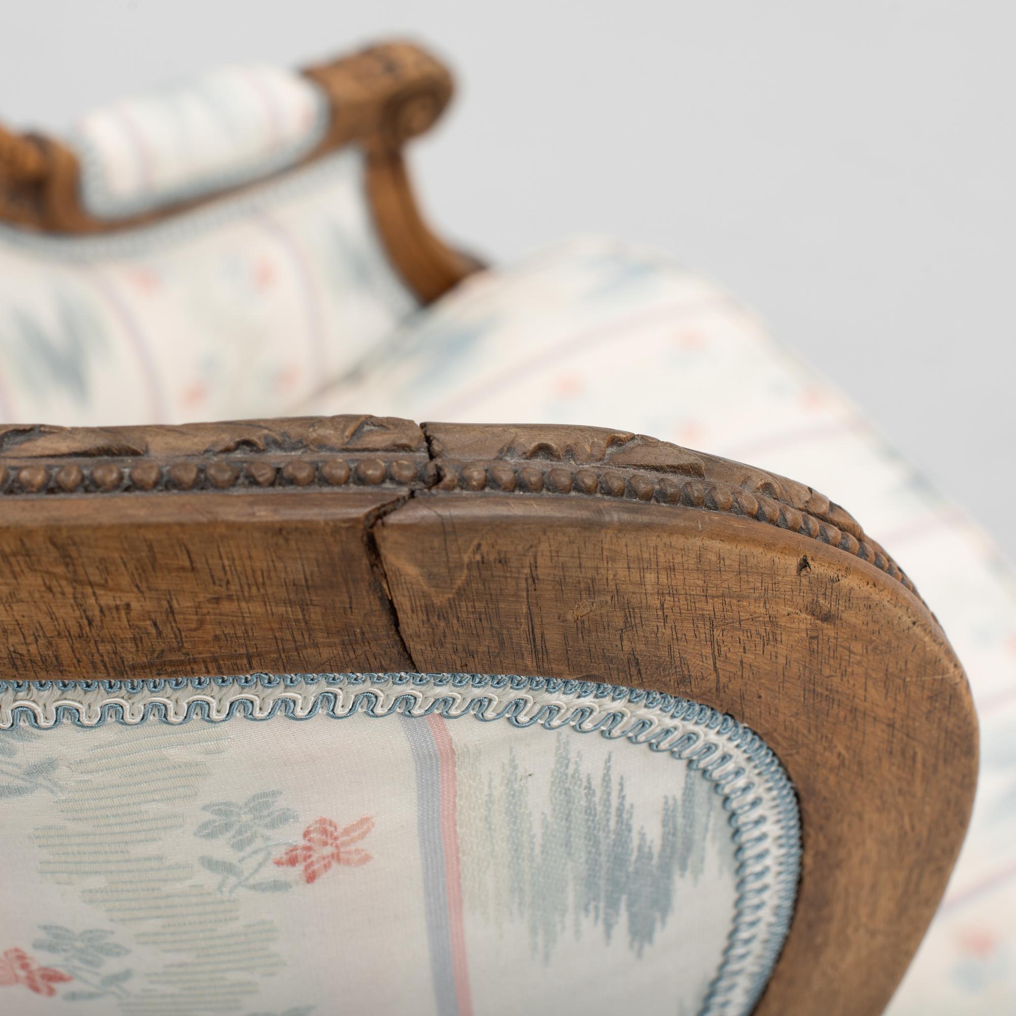 A Louis XVI-style bergere, late 19th century.