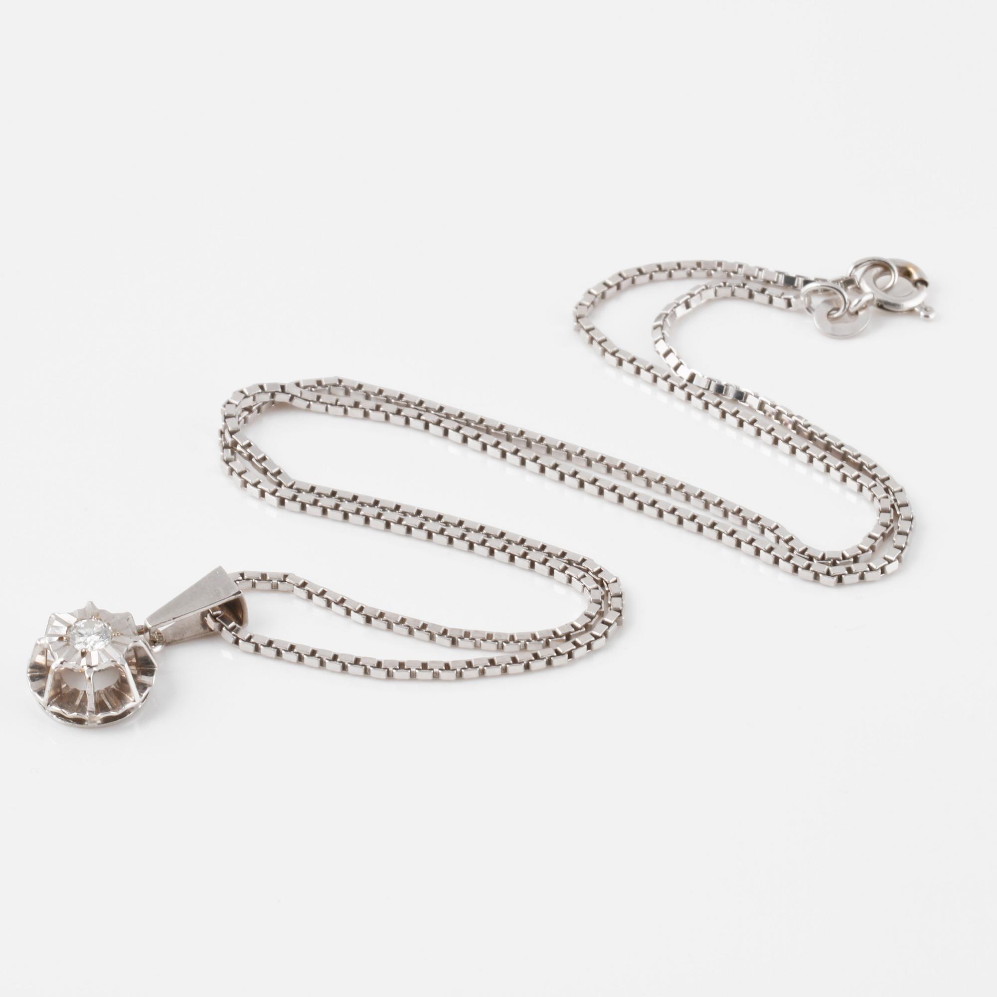 HÄNGE, 18K vitguld med briljantslipad diamant 0.20 ct. Vikt 8 gram.
