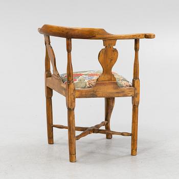 A Rococo armchair, mid 18th century.