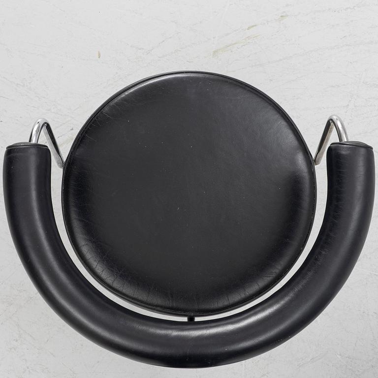 Charlotte Perriand, /Le Corbusier, swivel armchairs, a pair, model LC7, Cassina, Italy, later part of the 20th century.