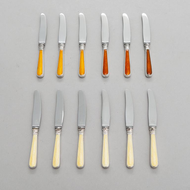 A set of twelve Tillander knives, enamel and silver (.916), Helsinki, Finland 1968. Danish steel blades.