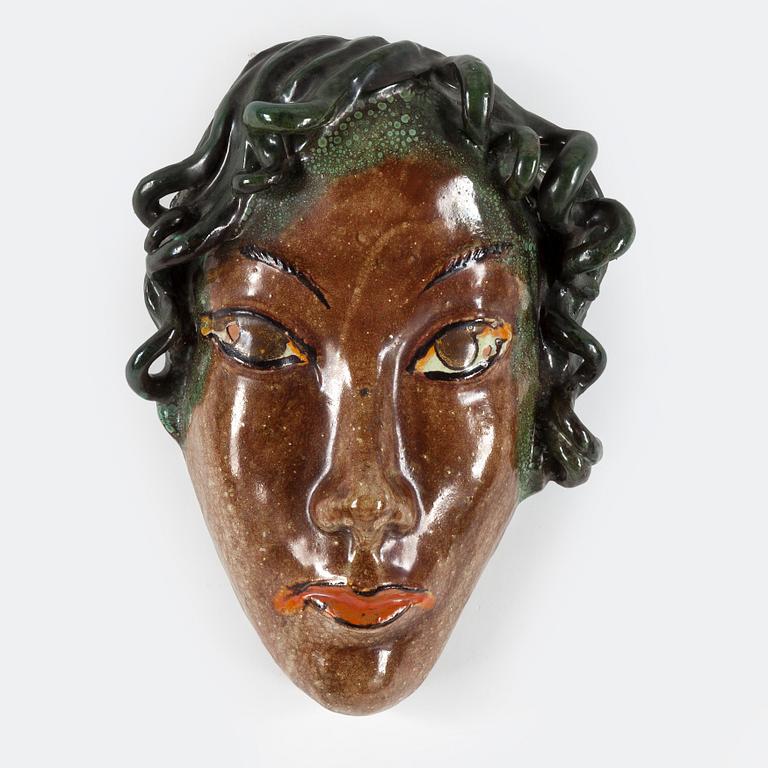 ALLAN EBELING, an earthenware decorative mask from Torshälla, signed.