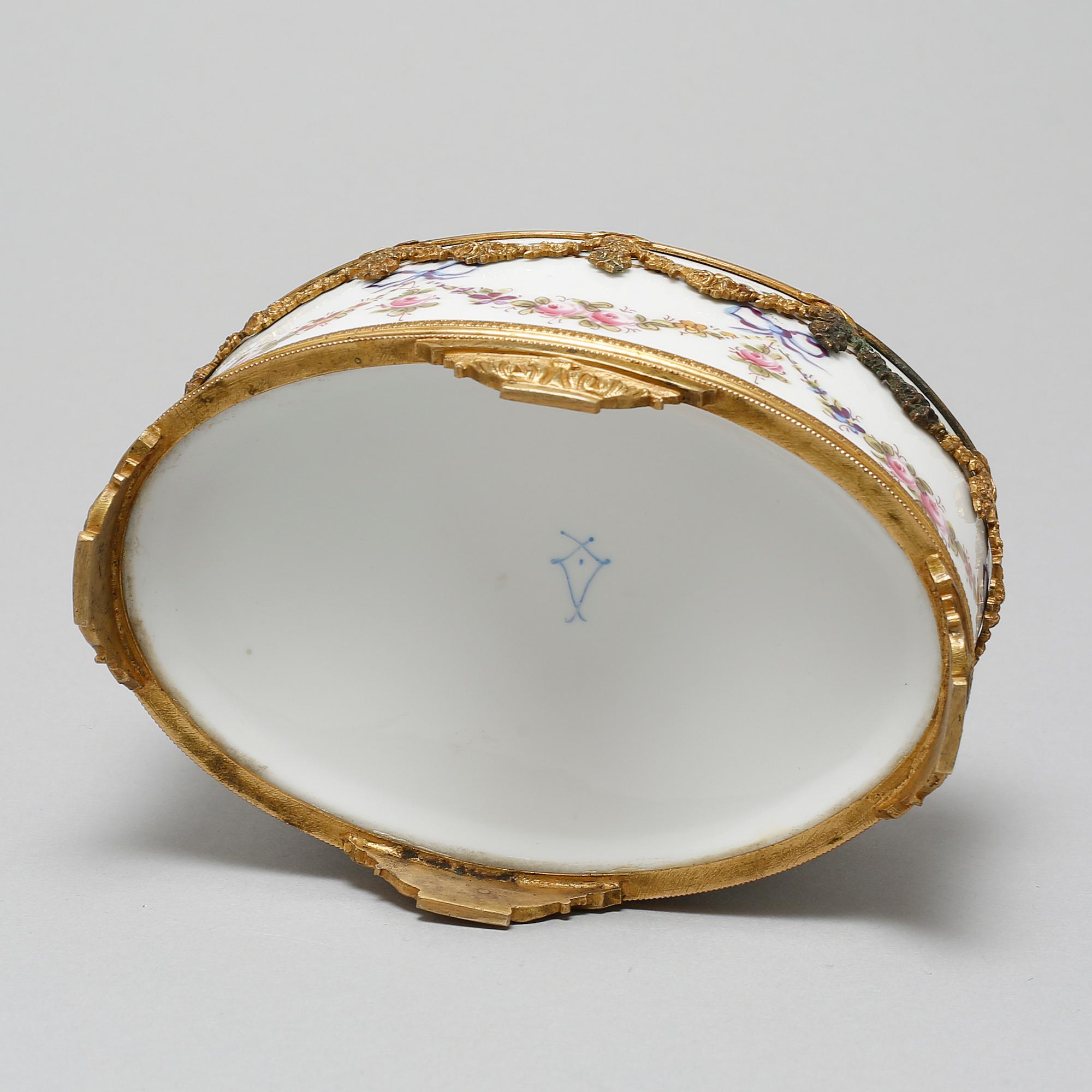 A porcelain bowl with a mark similar to Sèvres, around the year 1900.