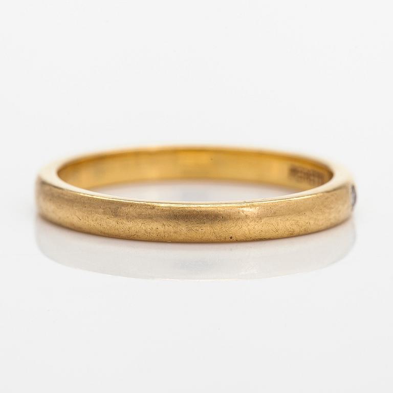 Tiffany & Co, Elsa Peretti, an 18K gold ring, with a small diamond.