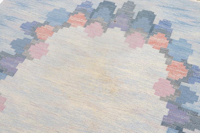 Judith Johansson, a carpet, 'Blomsterkrans', flat weave, c 273 x 208 cm, signed JJ.