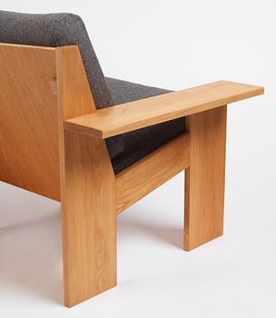 Uno & Östen Kristiansson, a pair of armchairs, an ottoman and a table model "Breda", Luxus, Vittsjö 1960s.