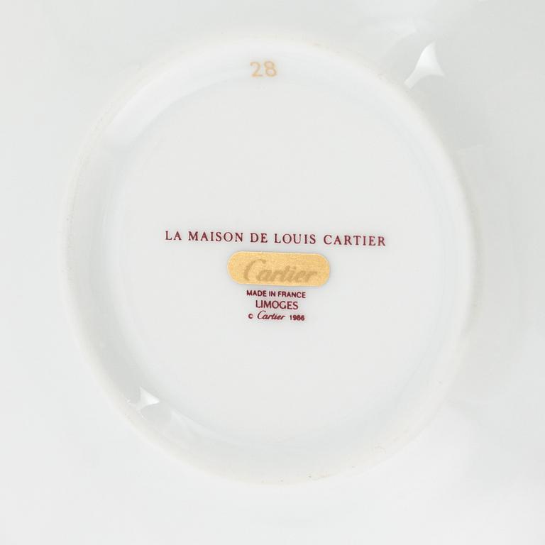 Cartier, four porcelain coffee cups, Limoges, France.