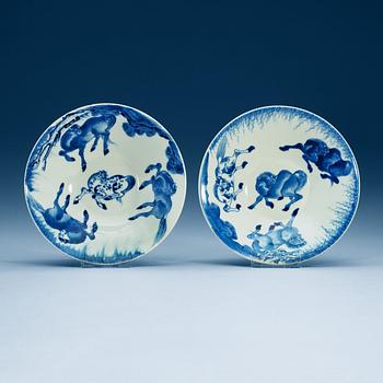 1813. A pair of blue and white bowls with eight horses, Qing dynasty, 18th Century.