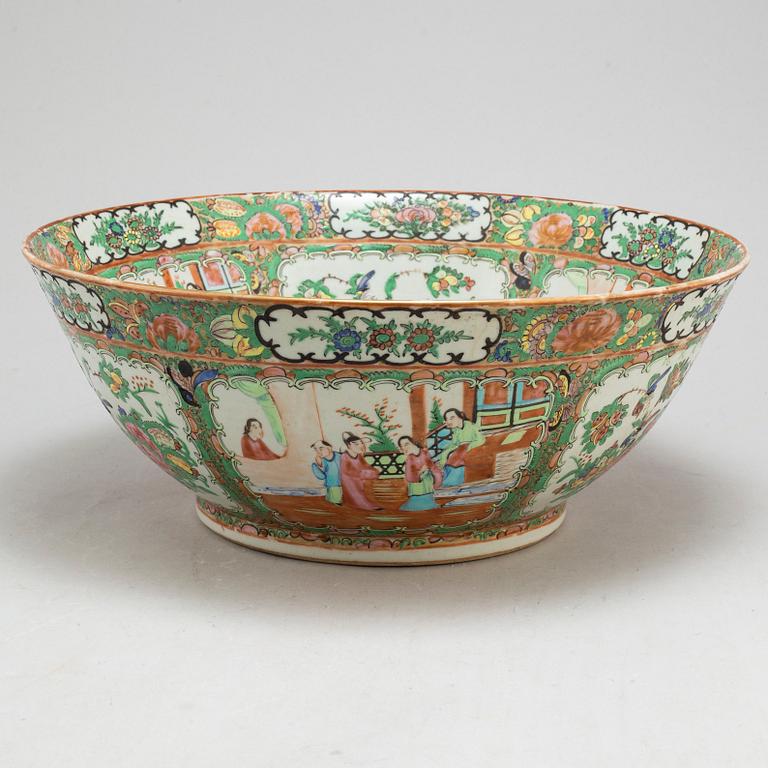 A famille rose 'Canton' punch bowl, Qing dynasty, late 19th century.