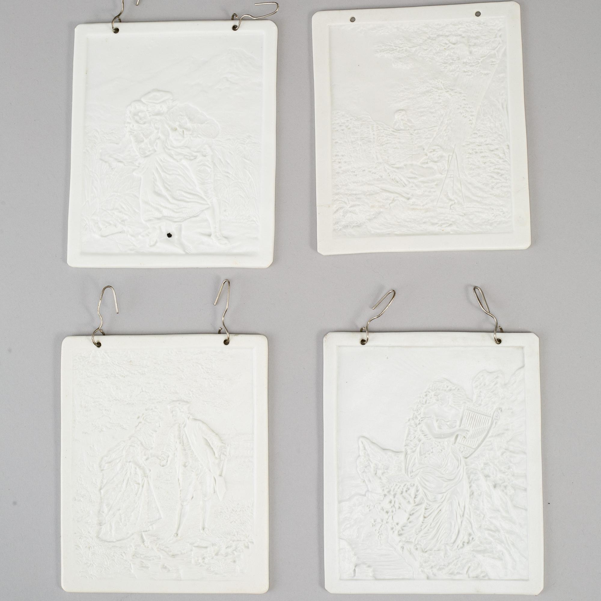 Four lithphane plaques, 19th century.