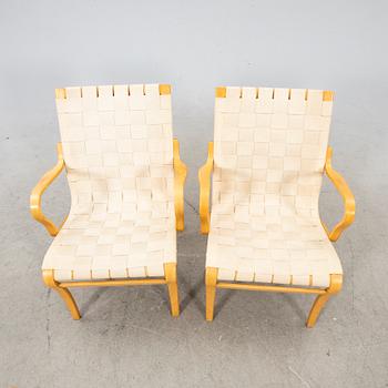 Bruno Mathsson, a pair of 'Mina' armchairs, Bruno Mathsson International, Värnamo, Sweden.