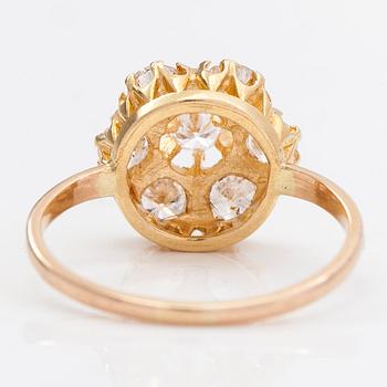 A 14K and 18K gold and diamond cluster ring ca 1.15 ct in total.