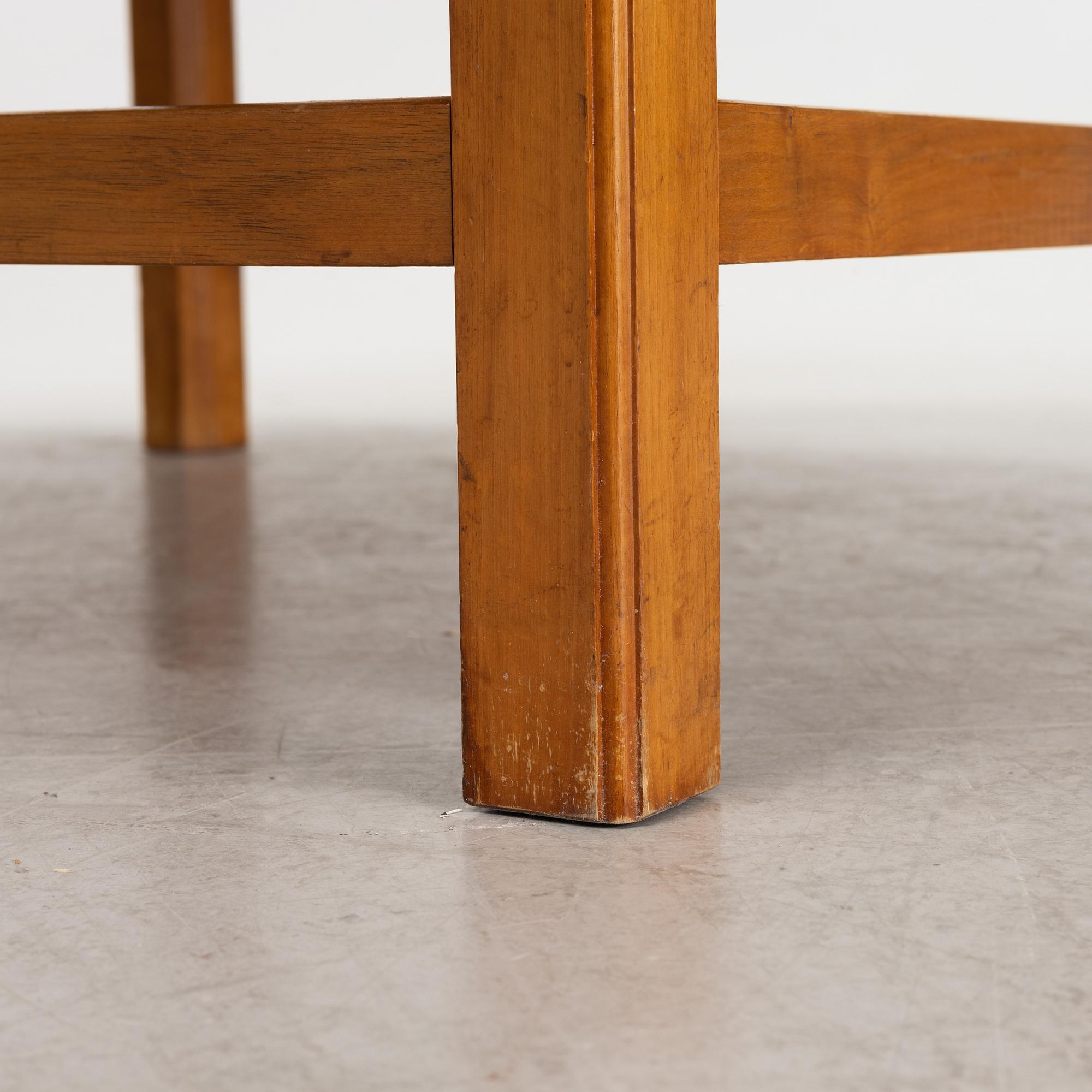 Josef Frank, a mahogany base table, map on the top, Svenskt Tenn, Sweden, model U601 (the top) & U491, 1960s-1970s.