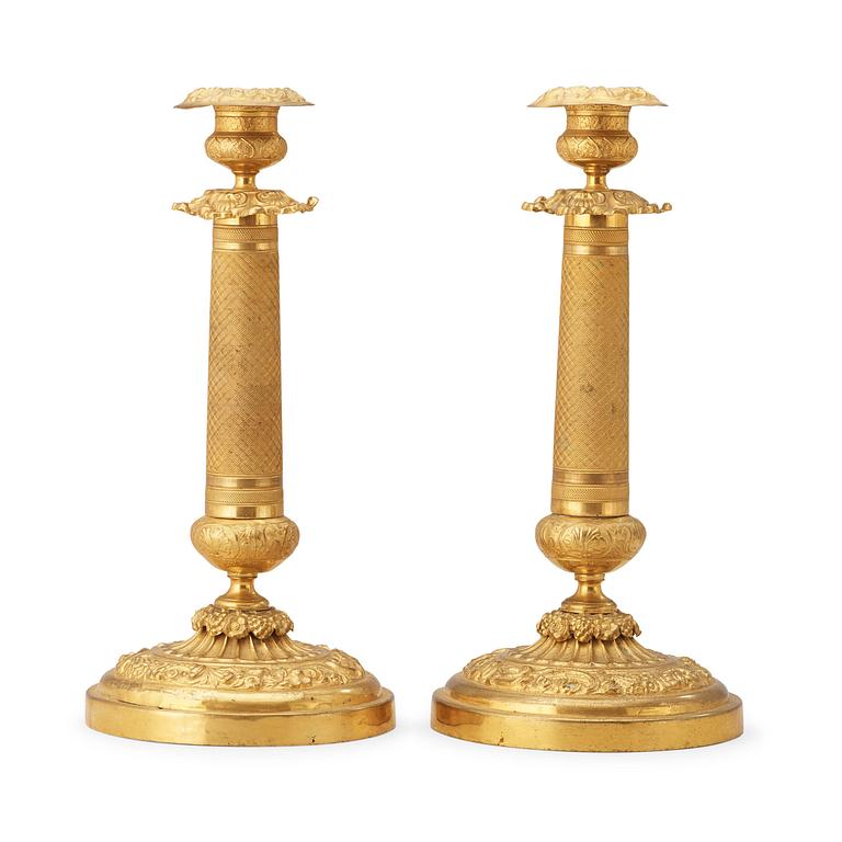 A pair of Russian 1830/40's brass candlesticks.