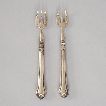 A set of twelve French 19th century silver oyster forks, mark of Hippolyte Thomas, Paris.