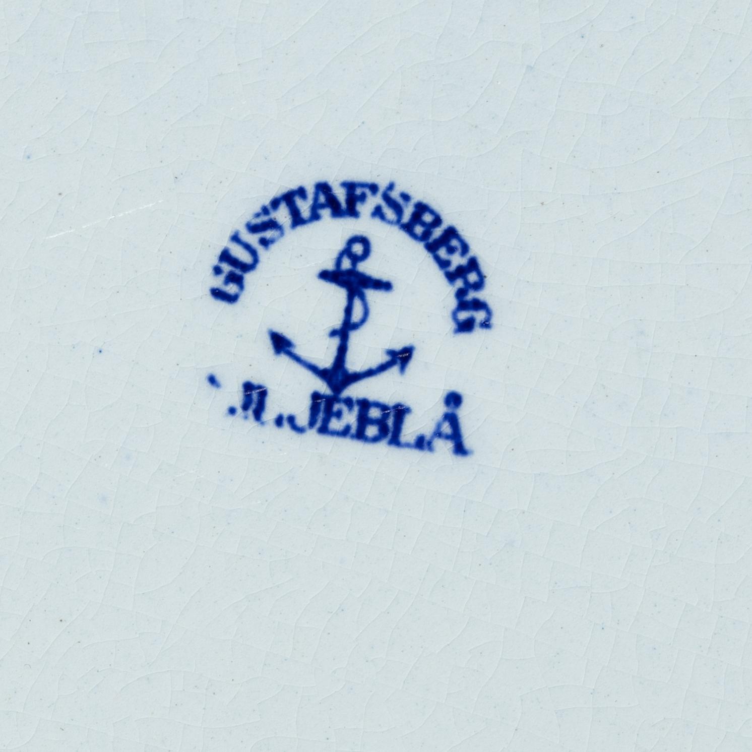 Wilhelm Kåge, 35 pieces of a 'Liljeblå' service, Gustafsberg, Sweden, 1918-1936.