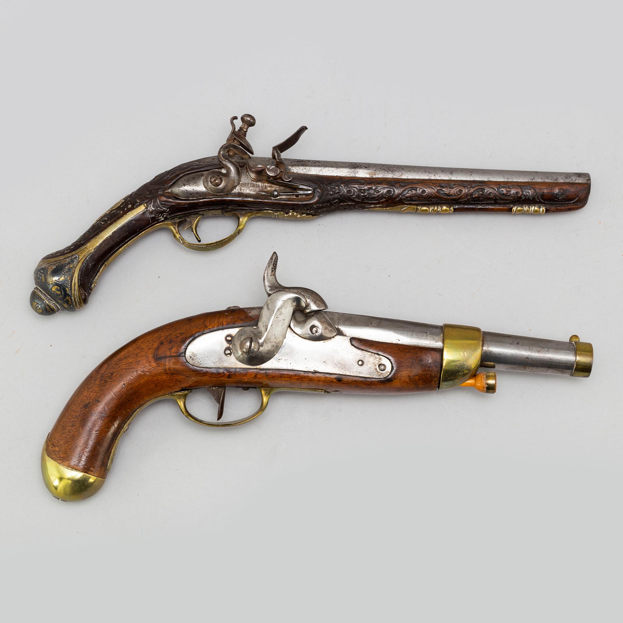 Two 19th Century pistols.