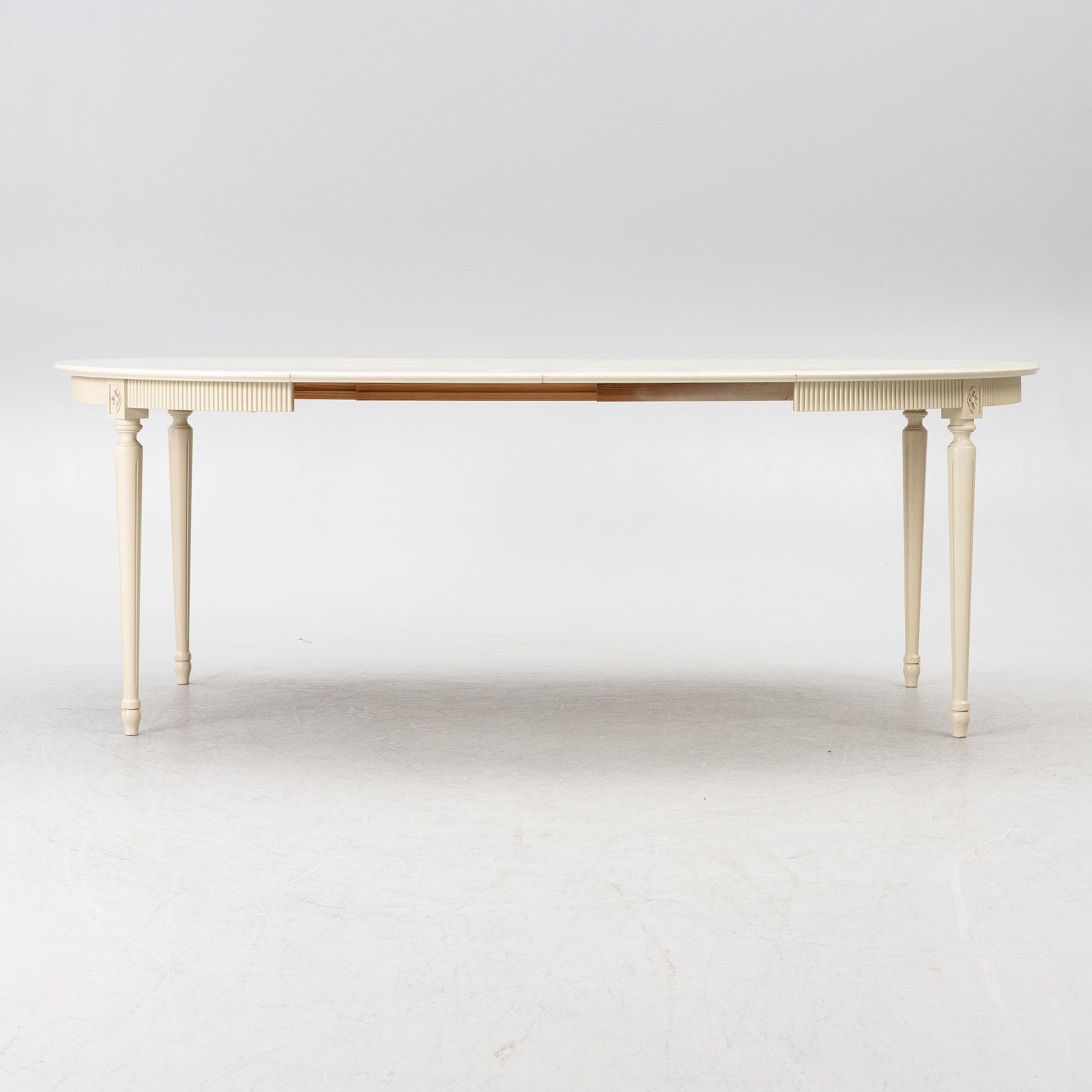 Dining table with 10 chairs, Gustavian style, second half of the 20th century.