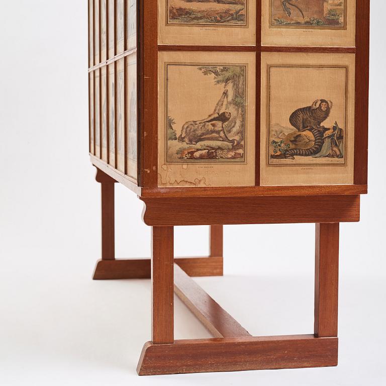 Josef Frank, 'Apskåpet' (The monkey cabinet), a rare cabinet covered with prints of different monkeys, Svenskt Tenn, Sweden ca 1941.