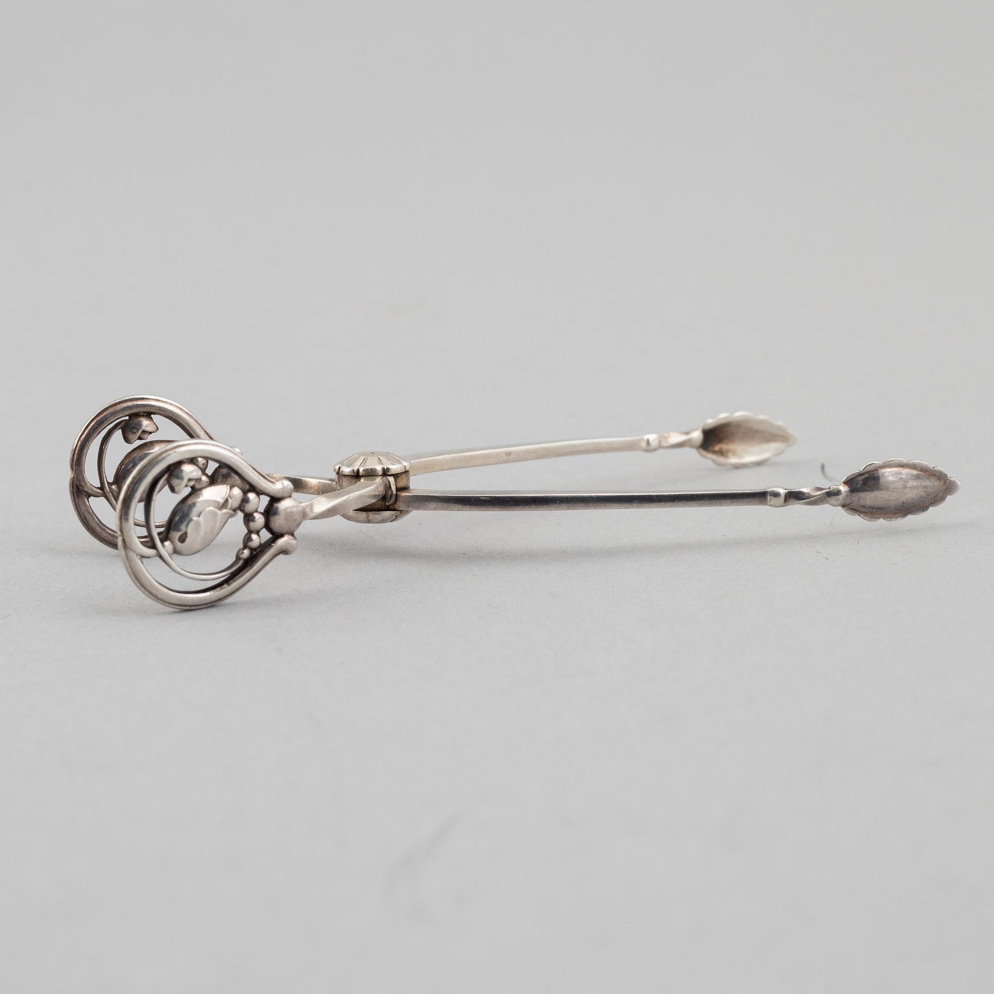 Three silver tongs, Sweden and Denmark, 1834-1923.