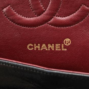 CHANEL, a quilted blue leather "Double Flap" shoulder bag.