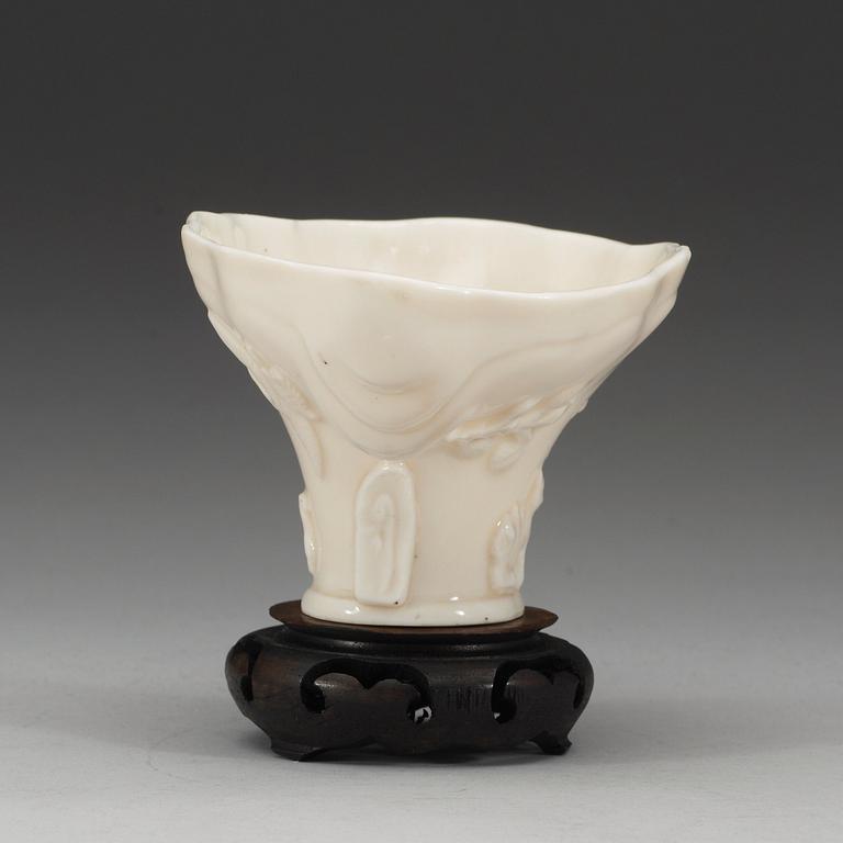 A blanc de chine libation cup, Qing dynasty.