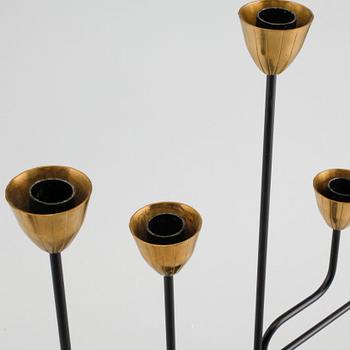 A candelabrum and one camdelstick by Gunnar Ander for Ystad Metall, 20th century.