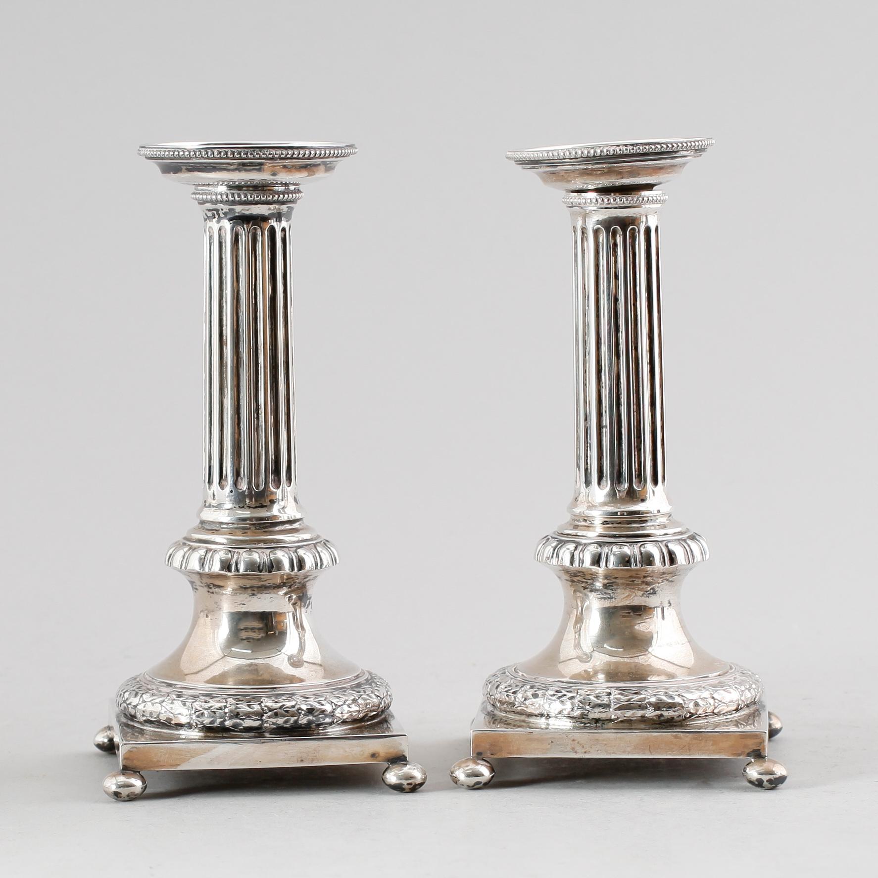 LJUSSTAKAR, 1 par, silver, CG Hallberg, Stockholm 1911/1912. Vikt ca 445 gram.