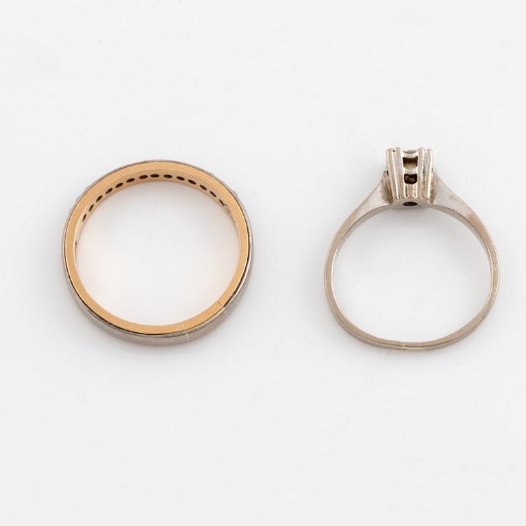 Two gold rings, with diamonds.