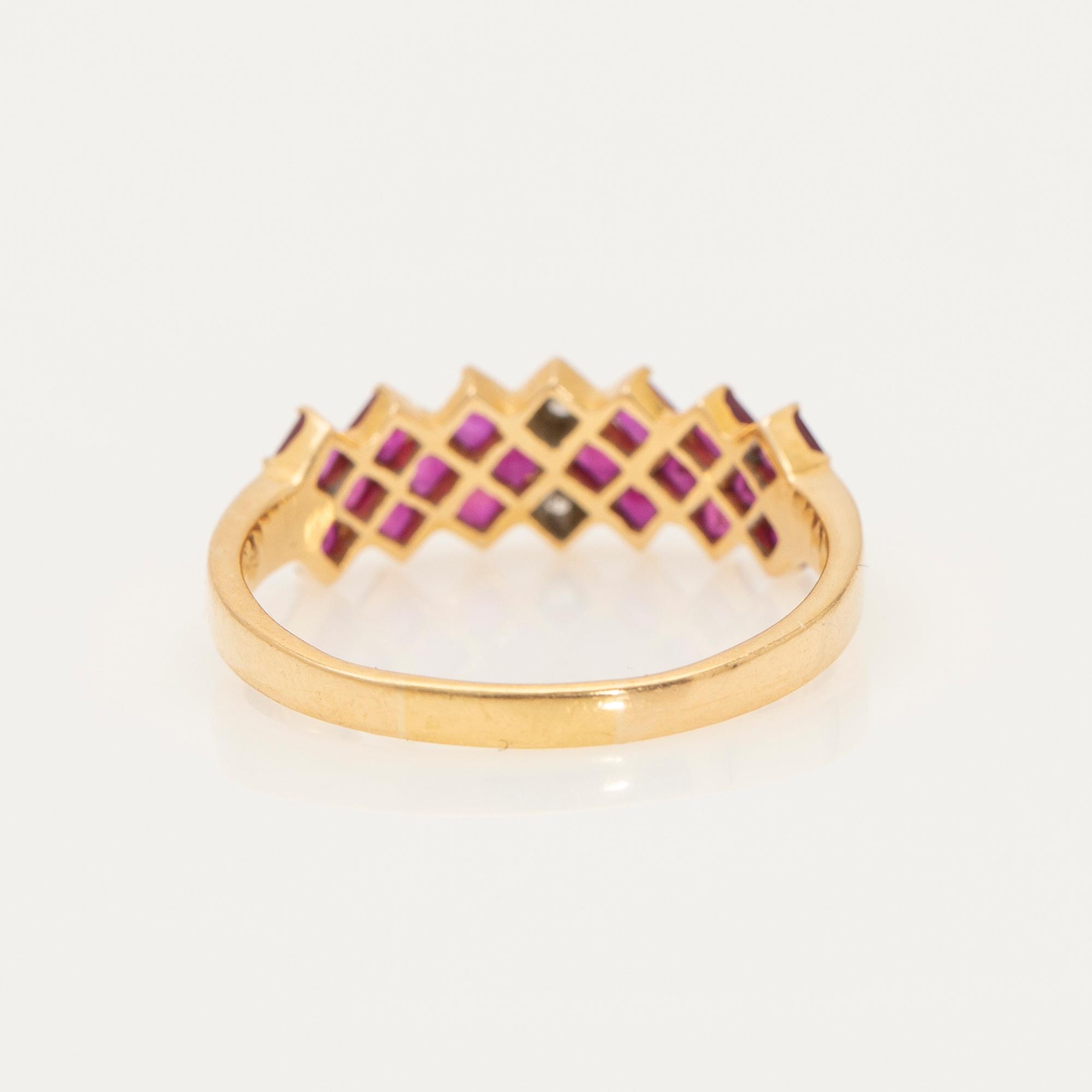 Ring, 18K gold with rubies and diamonds.