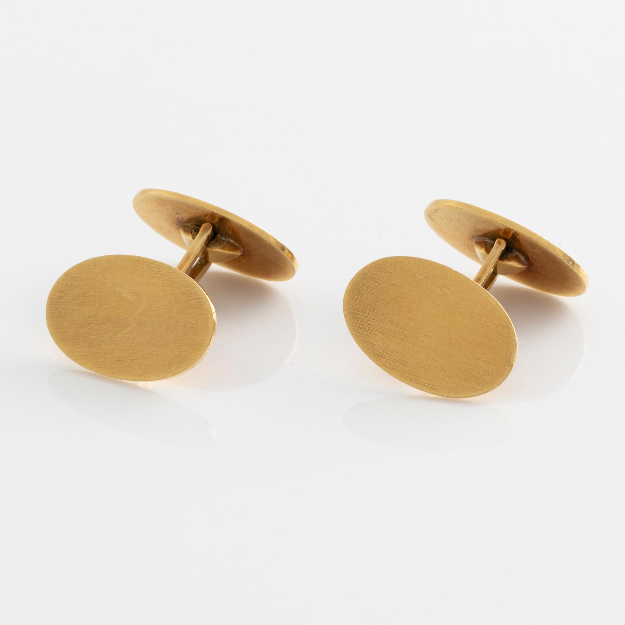 Ett par manschettknappar 18K guld.