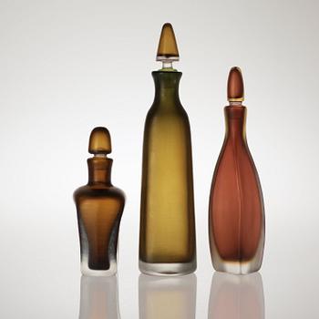 Three Paolo Venini 'Inciso' bottles, Venini, Murano, Italy, 1950's.