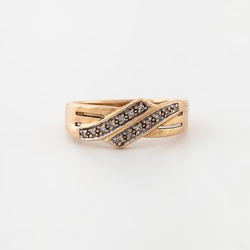 A single cut diamond ring.