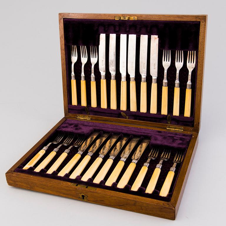 CUTLERY, 12+12, silver with bone handles, Sheffield 1894.